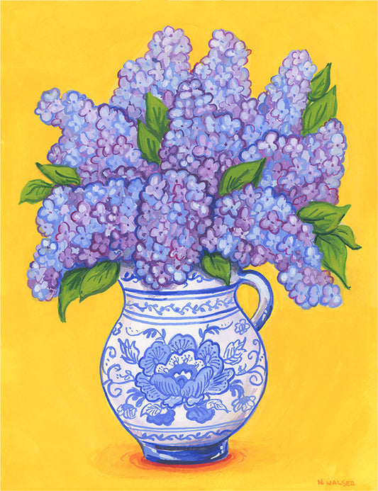 Vase of purple lilac flowers with green leaves on a yellow background with a blue and white vase