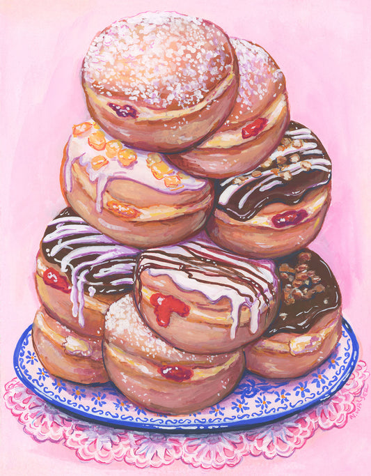 Stack of colorful donuts on a decorative plate with a pink background
